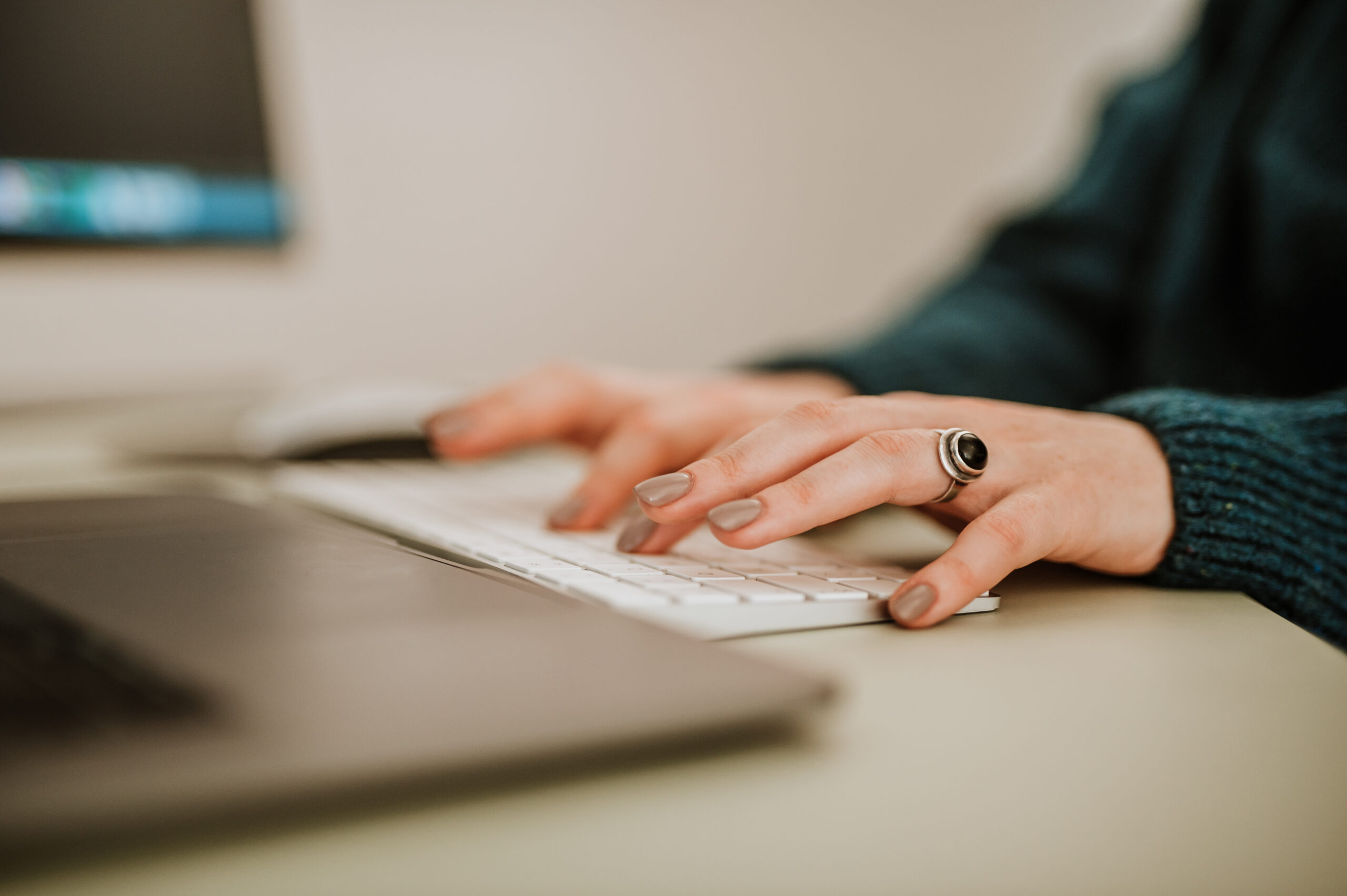 Engineer typing on a laptop keyboard